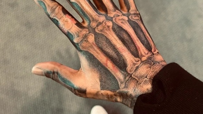 Do you find the skeleton hand tattoo attractive?