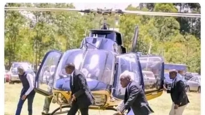 Why do people duck under a helicopter?