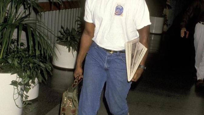 Why did everybody tuck their shirts in during the 90s?