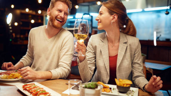 Girls, would you be ok with your husband having dinner and drinks with a female friend?
