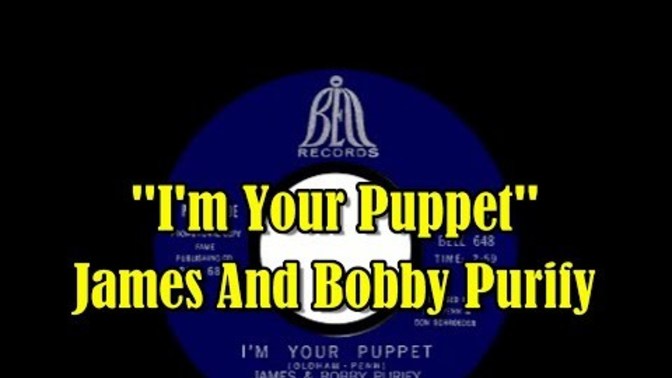 What song fits in good with these giant puppets?