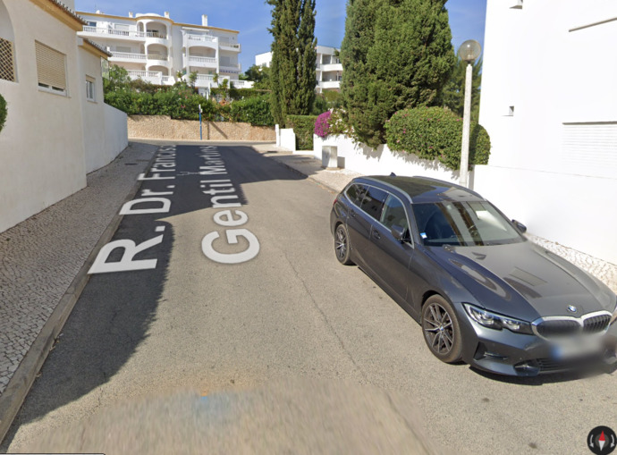 The window where the supposed abductor got through is the one on the left (beige shutters)