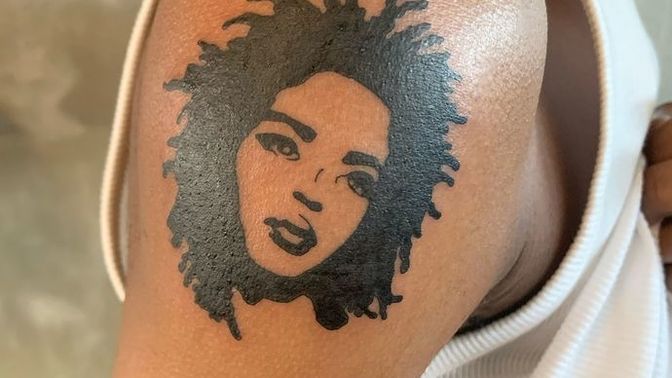 Men, if you were to get a tattoo of a female singer/celebrity you love and admire, who would it be?