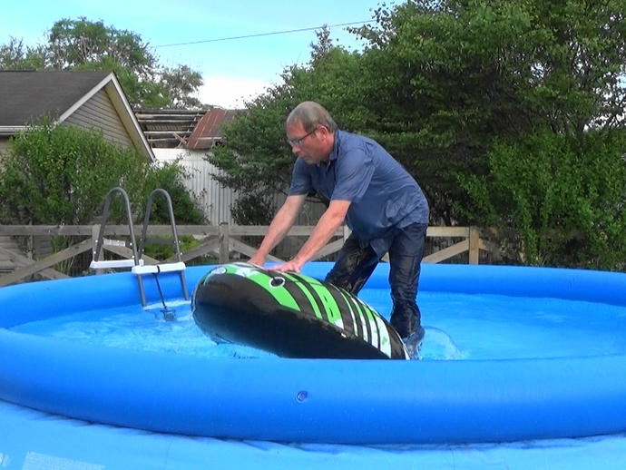 Jump in the pool with your clothes on. It's faster than going inside to change.