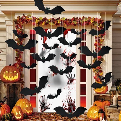 Why are bats and spiders associated with Halloween?