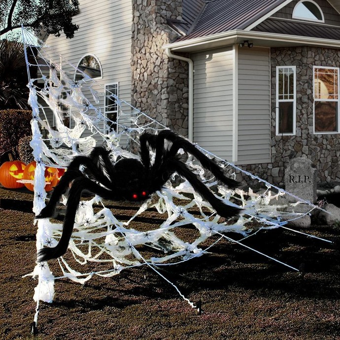Why are bats and spiders associated with Halloween?