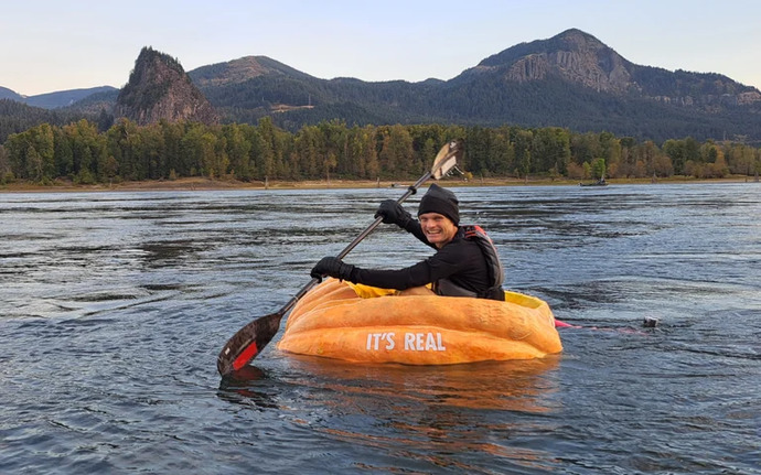 How about KUDOS to the guy who PADDLED a GIANT PUMPKIN?