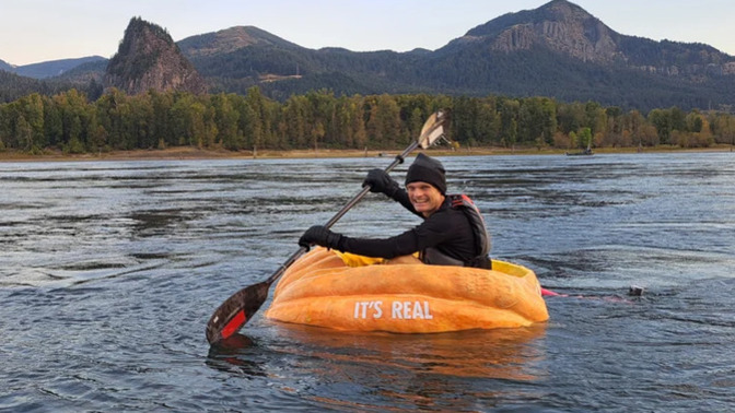 How about KUDOS to the guy who PADDLED a GIANT PUMPKIN?