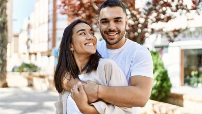 Does hand placement when posing with a guy for a photo mean anything?
