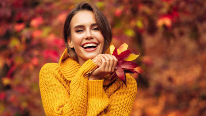 How should I dress to look stylish in the autumn and winter seasons?