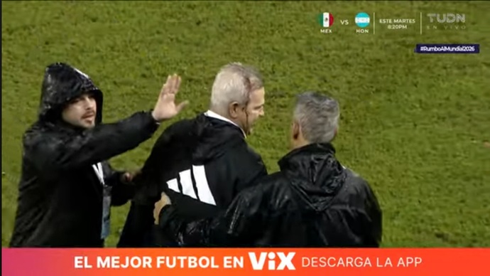 Did you guys see the Mexican coach get hit in the head with a full beer can?