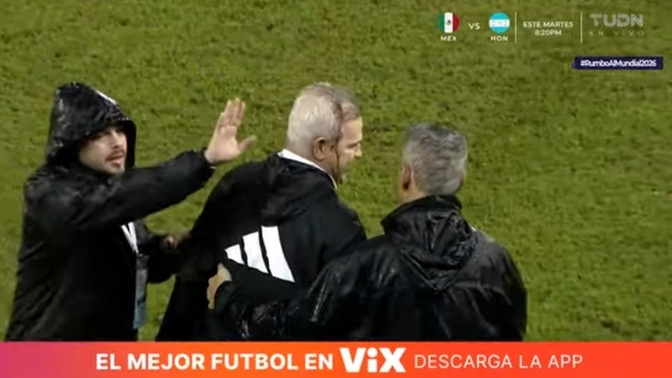 Did you guys see the Mexican coach get hit in the head with a full beer can?