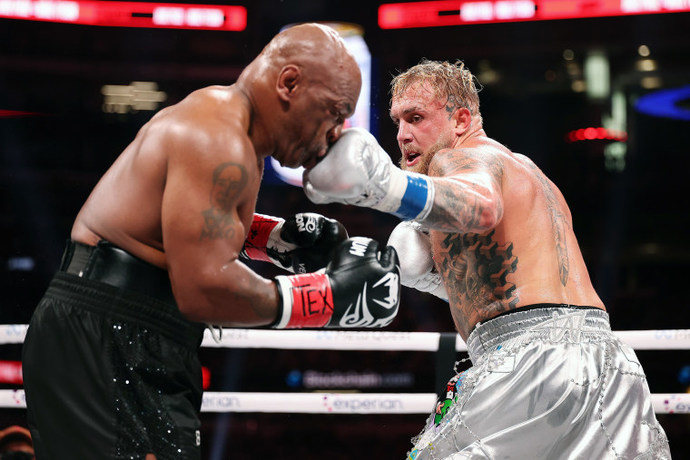 What are your thoughts on the boxing match between Mike Tyson and Jake Paul in Arlington, Texas? How did they do in their performance?