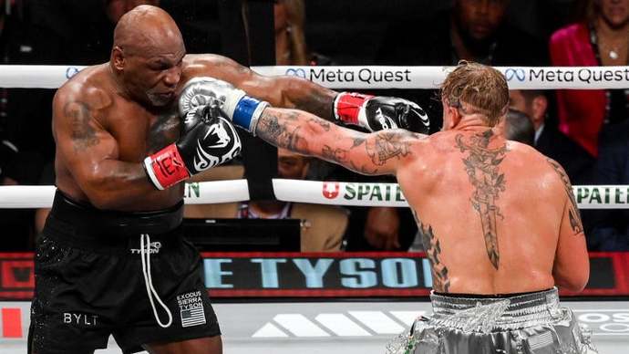 What are your thoughts on the boxing match between Mike Tyson and Jake Paul in Arlington, Texas? How did they do in their performance?