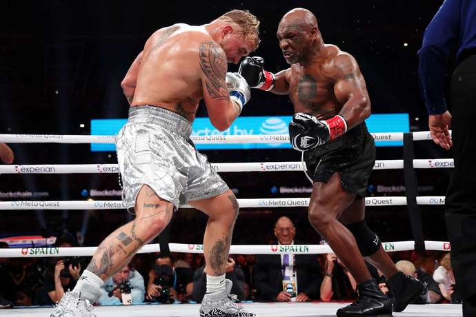 What are your thoughts on the boxing match between Mike Tyson and Jake Paul in Arlington, Texas? How did they do in their performance?