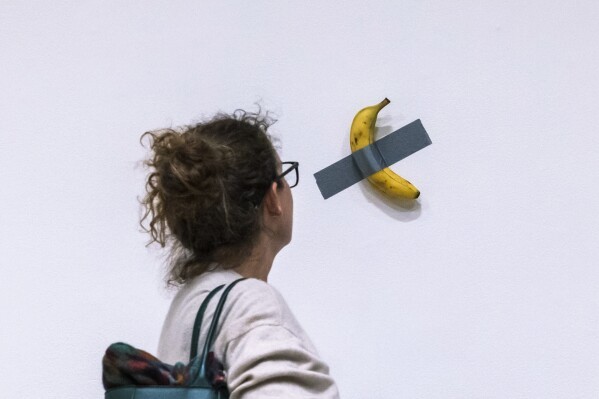 Would you buy a duct taped banana for 6.2 million dollars? How do you define this as art?