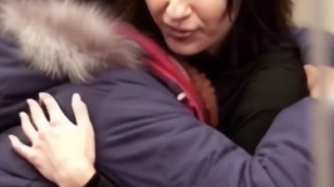 Would you let this woman give you a free hug?