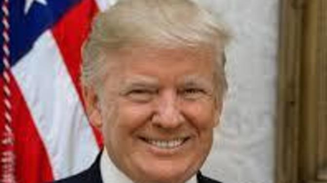 Why is Donald Trump so handsome and charismatic?