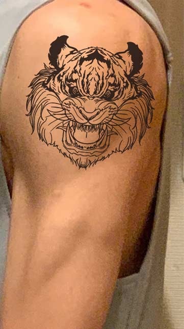 Which center of a tattoo place looks best at, bicep or shoulder blade?