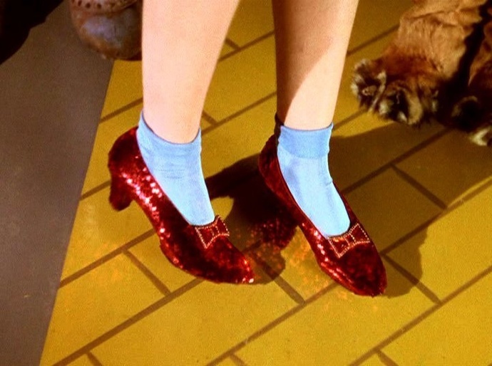 Ladies, do you like the iconic Wizard of Oz Ruby Slippers worn by the late Judy Garland and would y’all rock them if you wore them?