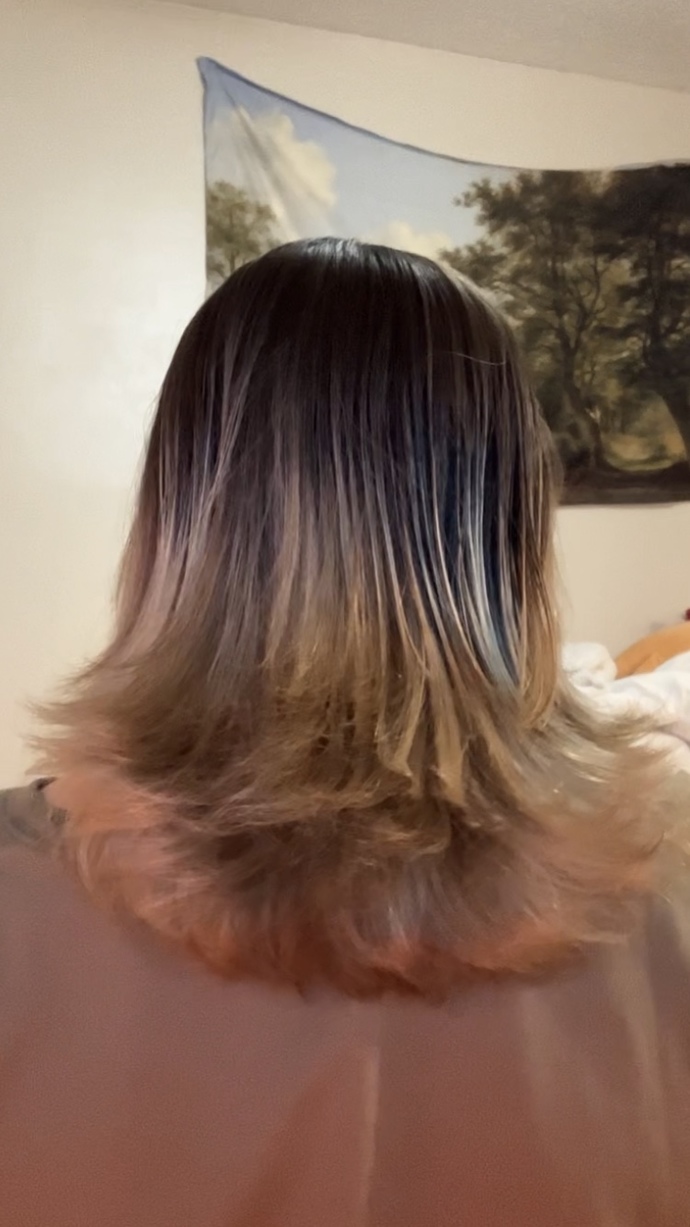 Trying to grow my hair down to my waist but I bleached it a year ago and it appears to be pretty damaged, should I chop it off?