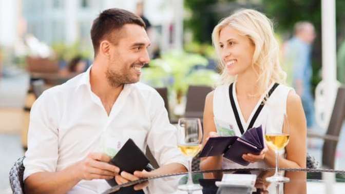 Should a real man let his woman always split the bill if she insists?