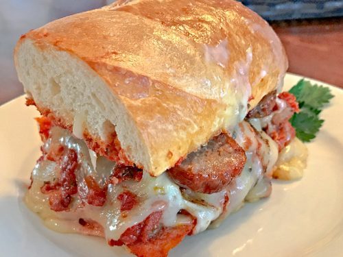 How do you eat a sausage sandwich?