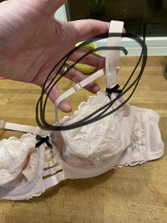 Can anyone tell me why there is an extra strap on this bra?