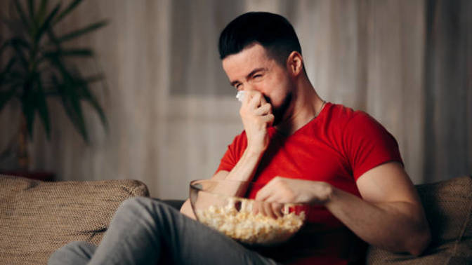 You watch a romance film with your male significant other and you see a few tears rolling down his cheek at a sad point in the film, how do you feel?
