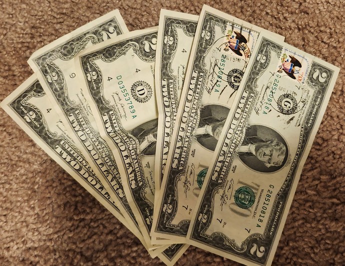Are people in schools so dumb they don't know what a $2 bill is?
