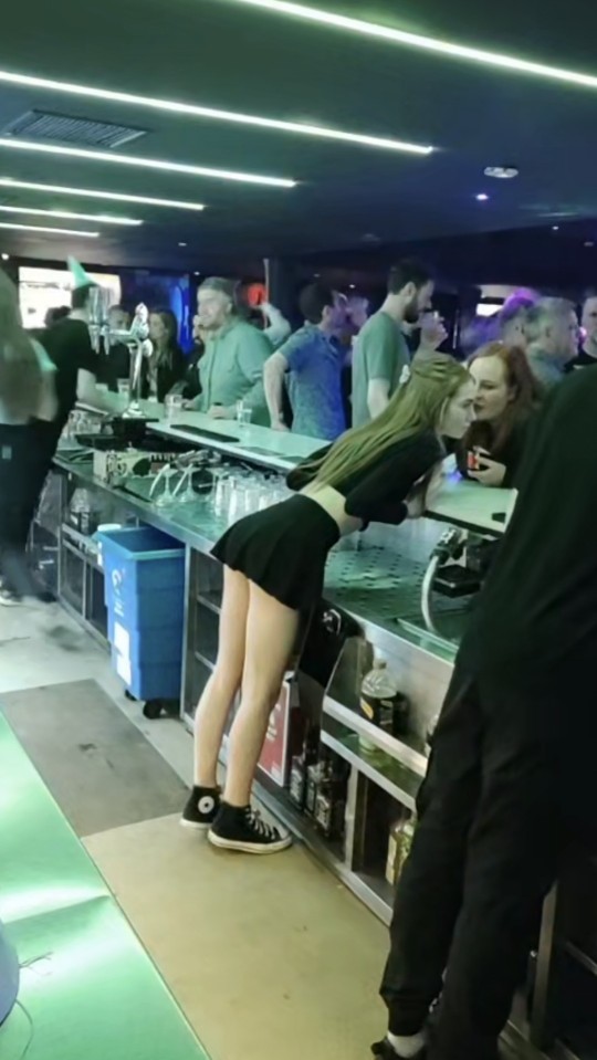 Why do girls who work in bars dress like hookers?