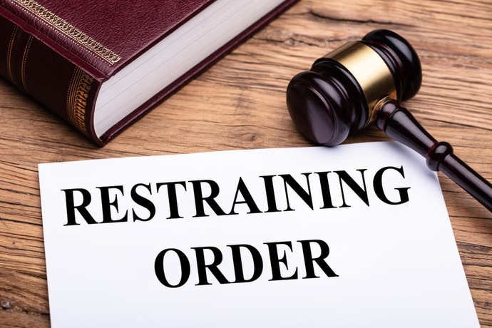 How much does a restraining order provides protection to a victim?