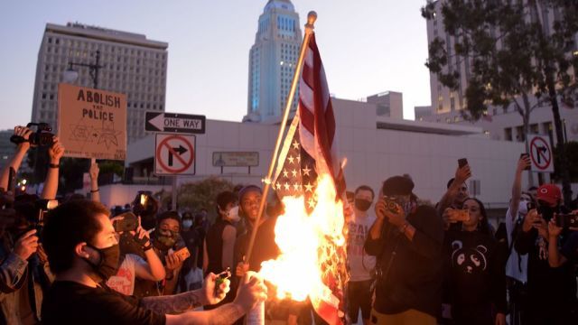 Some people fly foreign flags to show their heritage or support for another country. What's your take on this practice?