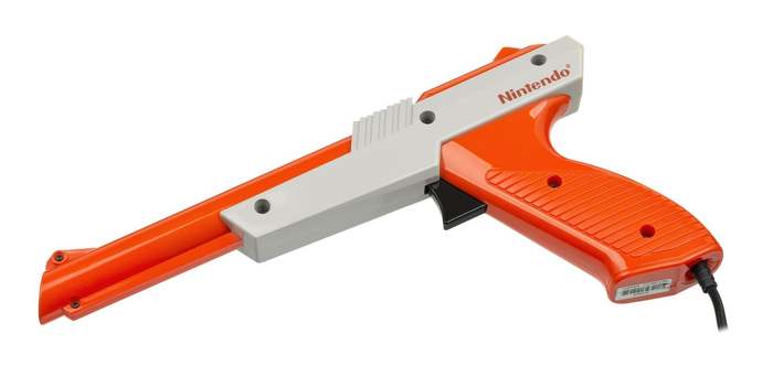 You hear a knock on the door and when you check it out you see a dude dressed all in black pointing an NES Zapper at you. what do you do?