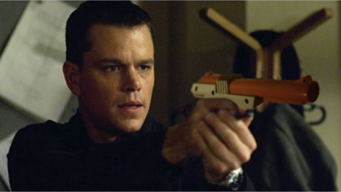 You hear a knock on the door and when you check it out you see a dude dressed all in black pointing an NES Zapper at you. what do you do?