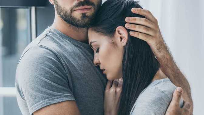 My partner struggles with trust due to the past. Things are good now, but she can't let go and is struggling internally. How can I help her with this?