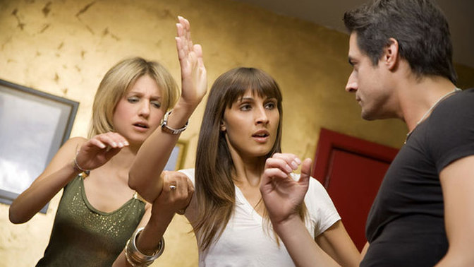 Why do women try to pull their friends away from men who approach them?