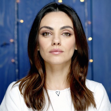 Why do women often appear to have unpleasant or unfriendly personalities in photos, yet many of them seem much more approachable and kind in person?