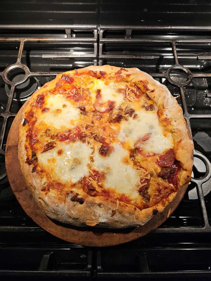I made pizza from scratch. How does it look?