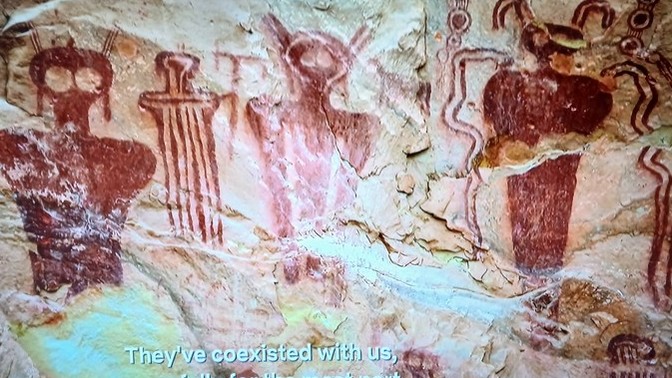 Are we being visited by aliens - or ourselves?