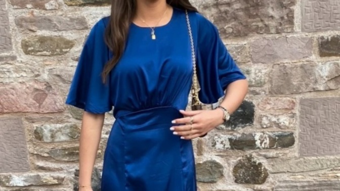 Is this an OK wedding guest dress, or does it look like a bridesmaids dress?
