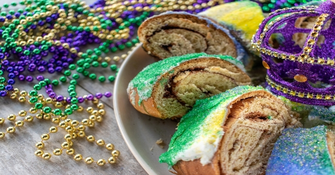 Beads (ya gotta earn them) and some cut up King Cake