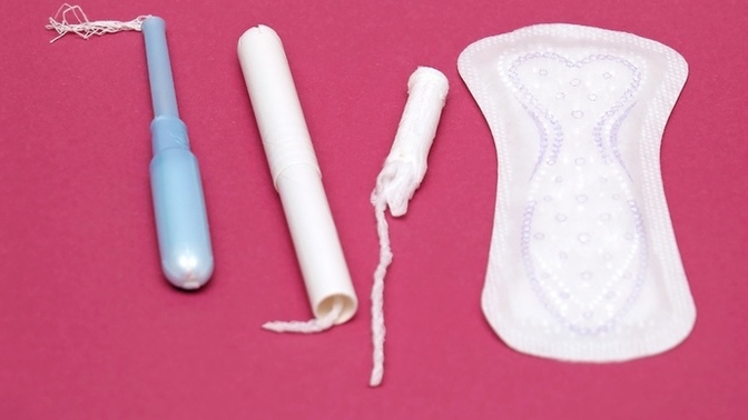 What is the total annual cost of feminine hygiene products?