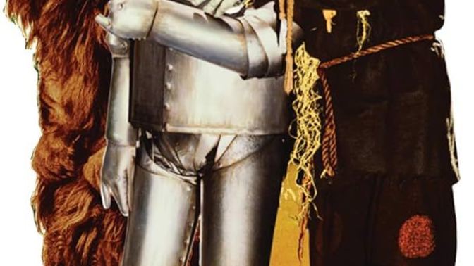 Which famous people are the equivalent of the scarecrow (heartless), tin man (brainless), and lion (cowardly) from The Wizard of Oz?
