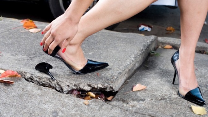 Why are heels hard to walk in?