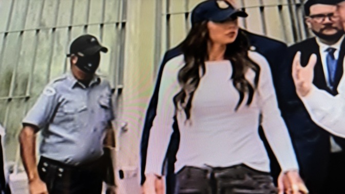 What are these prisoners thinking while being scolded by Kristi Noem?