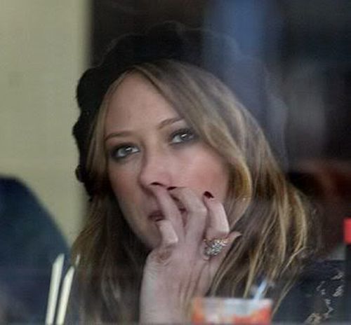 Hillary Duff trying to look dainty