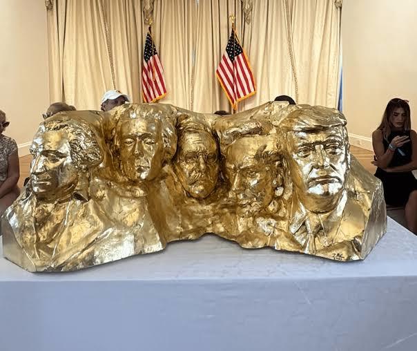 Trump has a Golden monument of Mt rushmore with his face on it at his home?