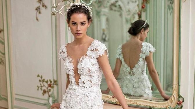 Girls, should brides try to look as hot as possible in their wedding dress? Or would that be considered trashy?