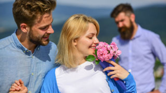Ex girlfriend always invites me to hangout with her and her new boyfriend. What should I make of it?